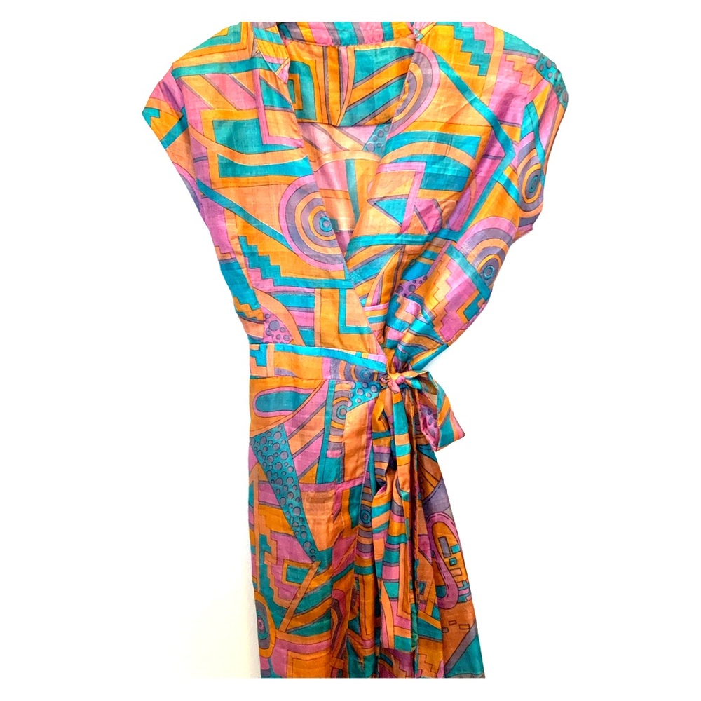Wrap dress. Never worn. No tag.